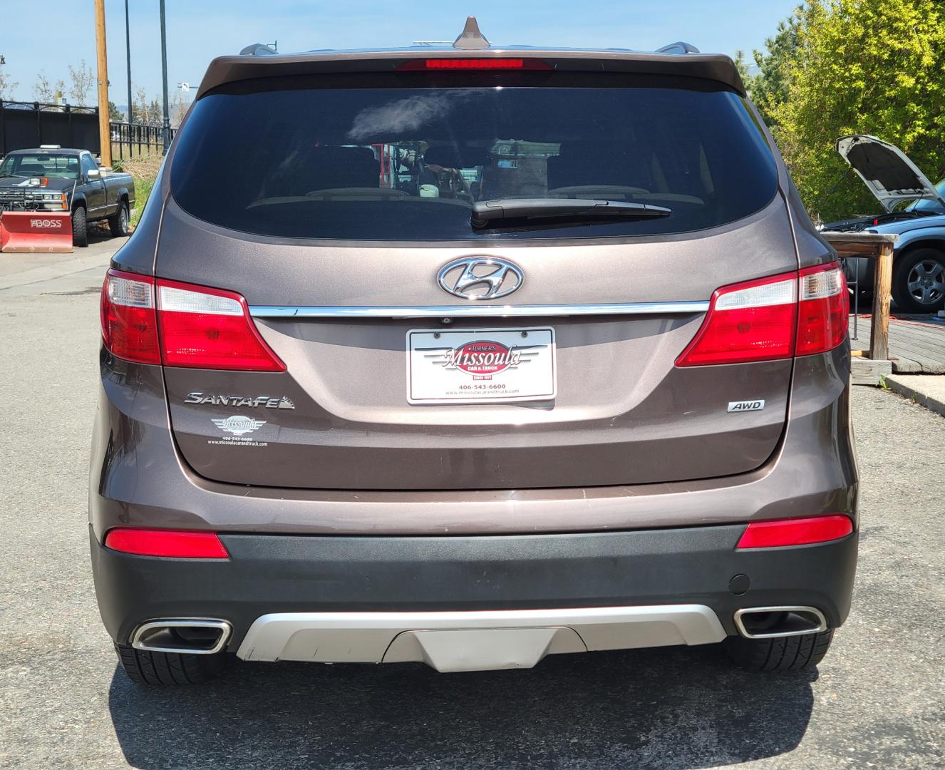 2015 Brown /Tan Hyundai Santa Fe GLS (KM8SMDHF7FU) with an 3.3L V6 engine, 6 Speed Auto transmission, located at 450 N Russell, Missoula, MT, 59801, (406) 543-6600, 46.874496, -114.017433 - Photo#4